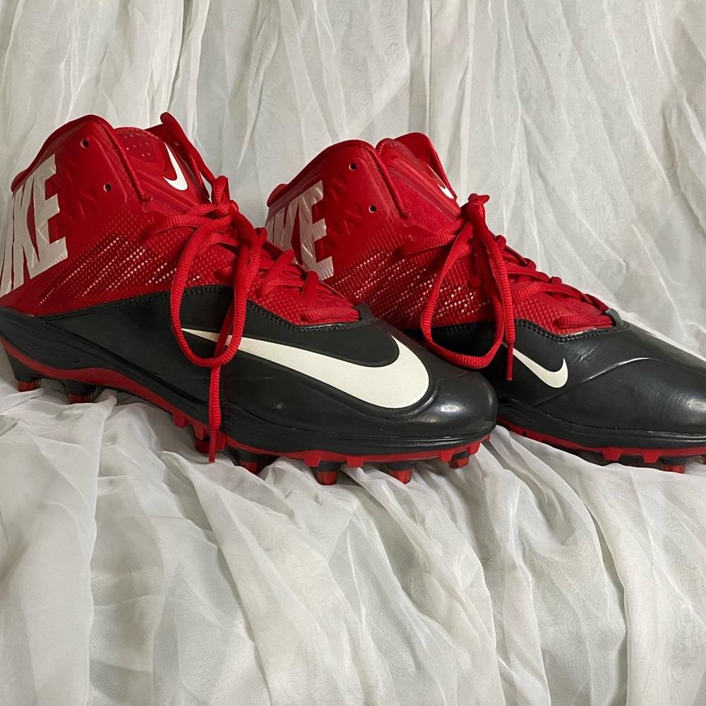 Nike black and red football cleats